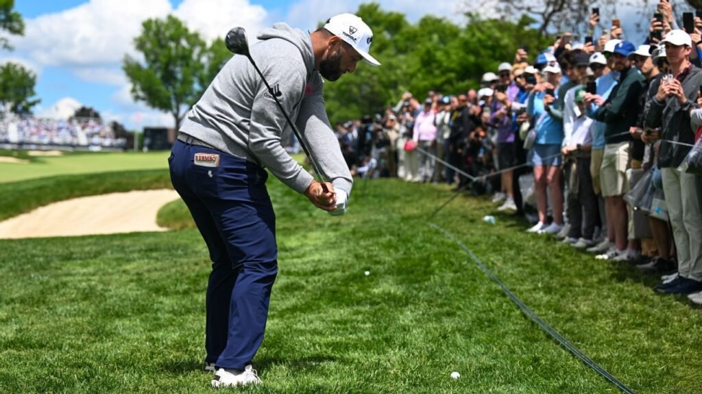 Jon Rahm apologizes as divot from angry swing hits volunteer