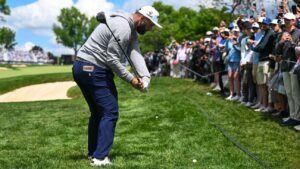 Jon Rahm apologizes as divot from angry swing hits volunteer