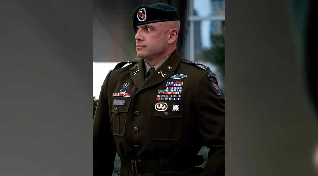 Nick Lavery at attention wearing his uniform