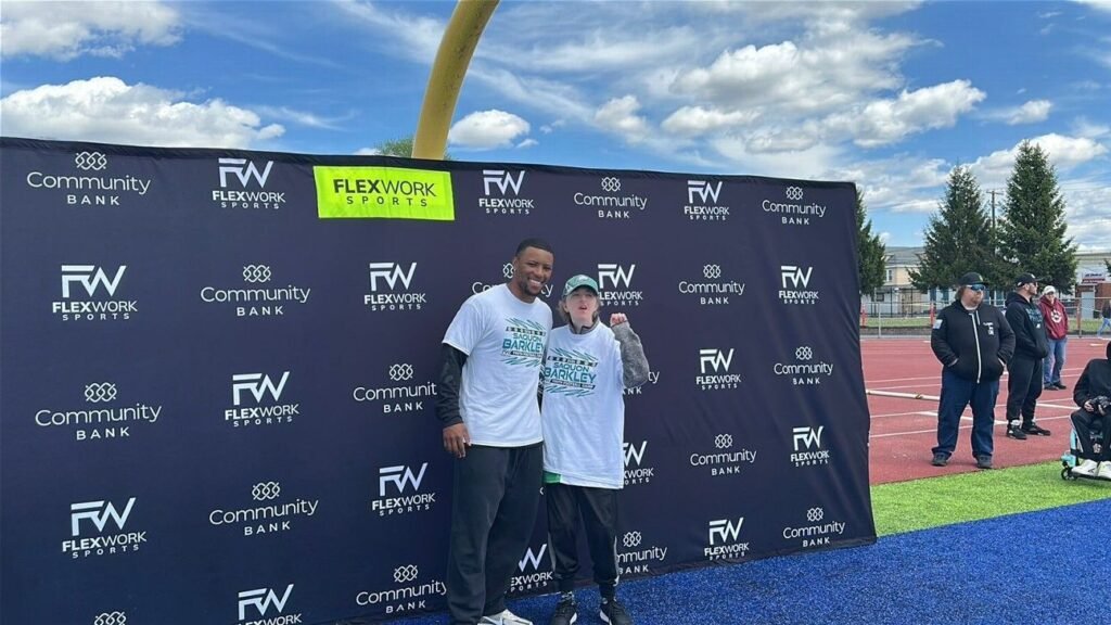 Saquon Barkley provides experience of a lifetime for fan at youth camp