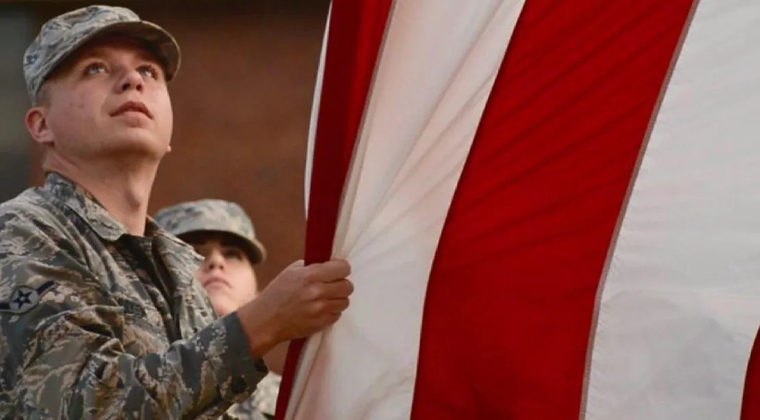 Sean Hudson Lowering the American Flag